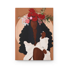 Load image into Gallery viewer, A matte hardcover journal with a cover illustration of a woman with a floral headdress and a dress, sitting in a contemplative pose.
